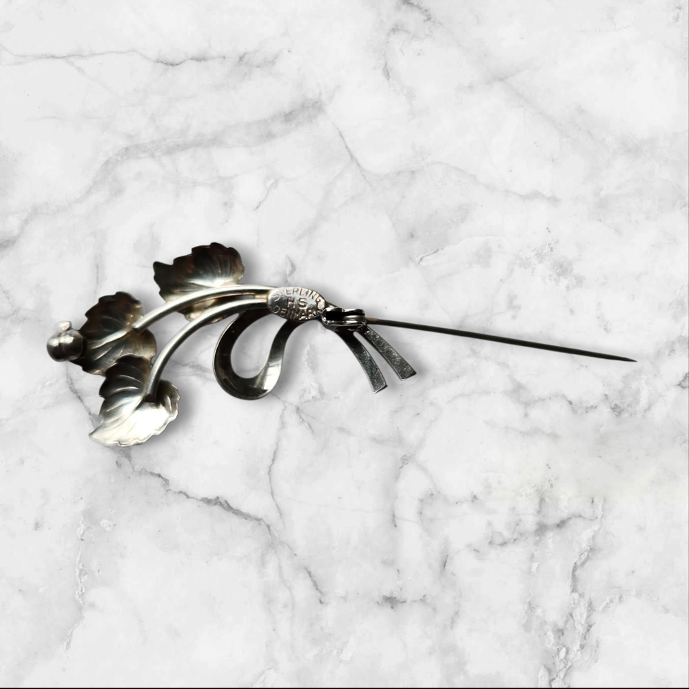 Elegant Silver Floral Brooch